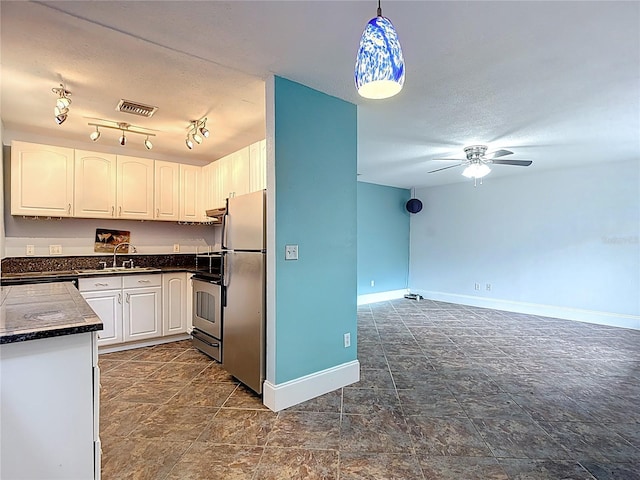 11718 Raintree Village Blvd Unit C, Temple Terrace, FL 33617 - kitchen featuring stainless steel appliances, a ceiling fan, white cabinets, and decorative light fixtures