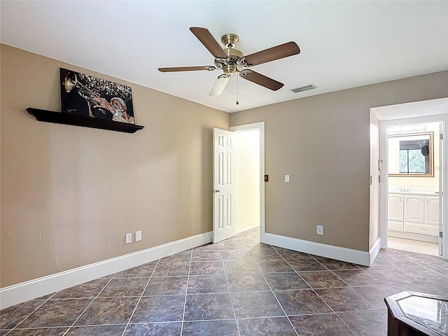 11718 Raintree Village Blvd Unit C, Temple Terrace, FL 33617 - unfurnished room with baseboards and ceiling fan