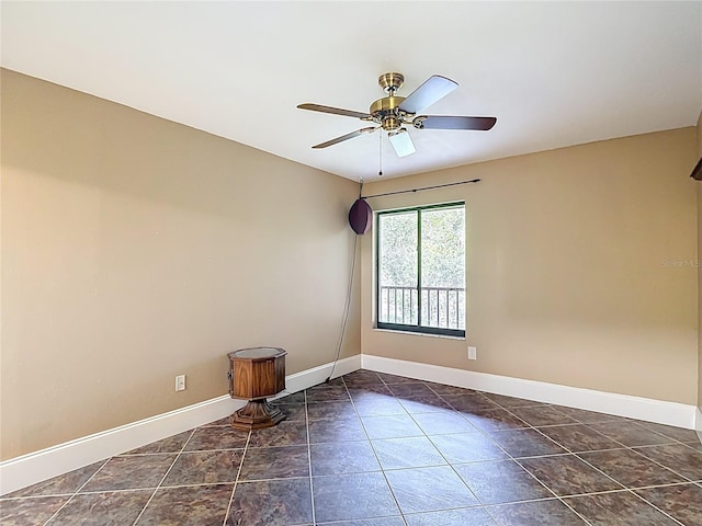 11718 Raintree Village Blvd Unit C, Temple Terrace, FL 33617 - unfurnished room with baseboards and ceiling fan