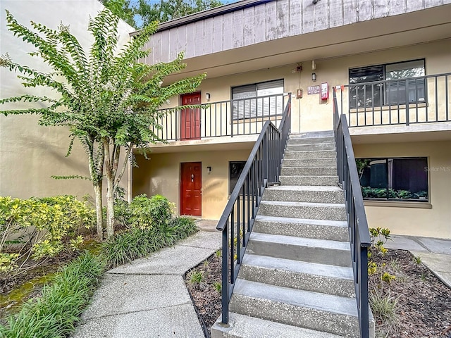 11718 Raintree Village Blvd Unit C, Temple Terrace, FL 33617 - entrance to property with stucco siding