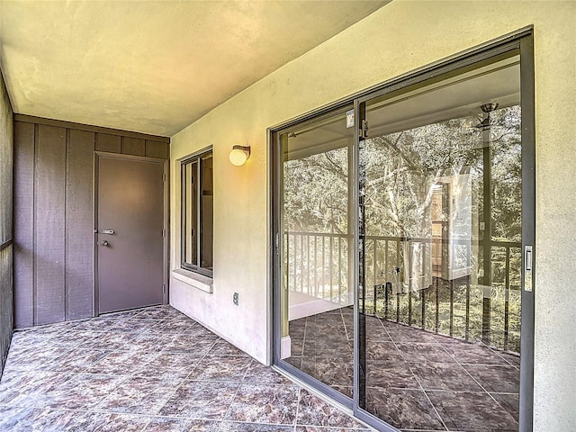 11718 Raintree Village Blvd Unit C, Temple Terrace, FL 33617 - doorway to property with stucco siding
