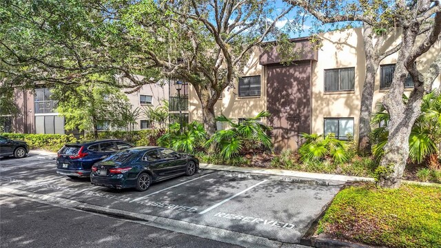 11718 Raintree Village Blvd Unit C, Temple Terrace, FL 33617 - view of uncovered parking lot