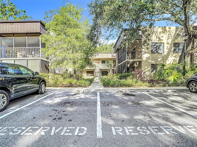 11718 Raintree Village Blvd Unit C, Temple Terrace, FL 33617 - view of uncovered parking lot
