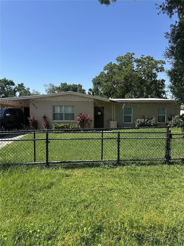 7614 35th Ave S, Tampa, FL 33619 - view of front of house featuring a carport