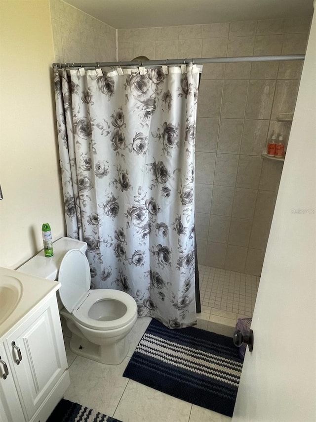 408 Blueberry Ln, Brandon, FL 33510 - bathroom with a stall shower, tile patterned floors, and vanity