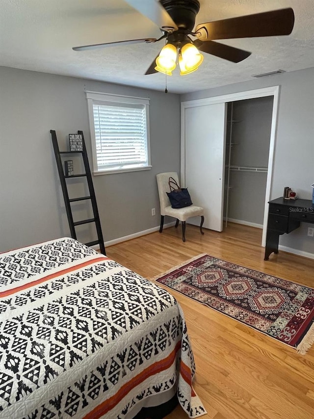 408 Blueberry Ln, Brandon, FL 33510 - bedroom featuring a closet, wood finished floors, and ceiling fan