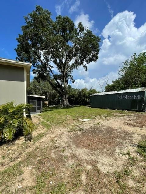 408 Blueberry Ln, Brandon, FL 33510 - view of yard featuring a sunroom