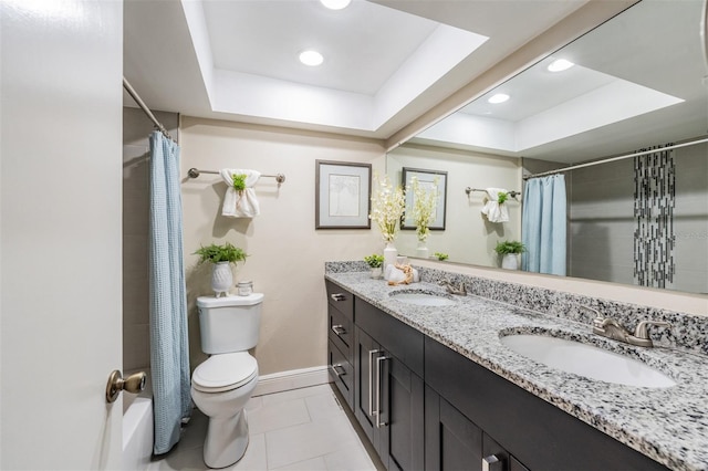 13521 Del Prado Dr S, Largo, FL 33774 - bathroom featuring a raised ceiling, double vanity, tile patterned floors, recessed lighting, and shower / bath combo with shower curtain