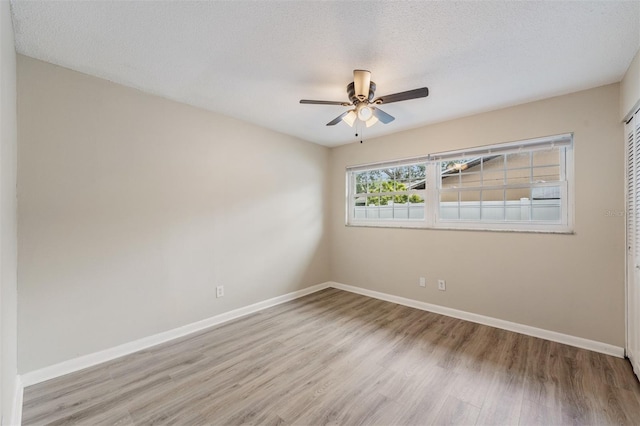 13521 Del Prado Dr S, Largo, FL 33774 - unfurnished room with light wood-type flooring and a ceiling fan