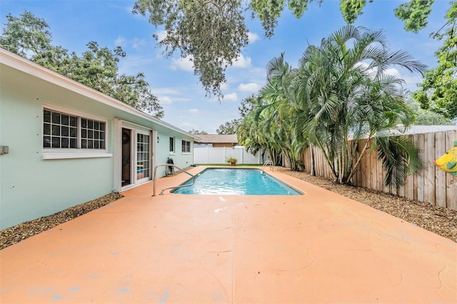13521 Del Prado Dr S, Largo, FL 33774 - view of pool with a patio area and a fenced backyard