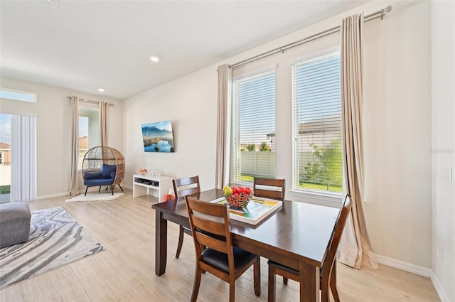 11713 Tetrafin Dr, Riverview, FL 33579 - dining space with light wood finished floors and recessed lighting