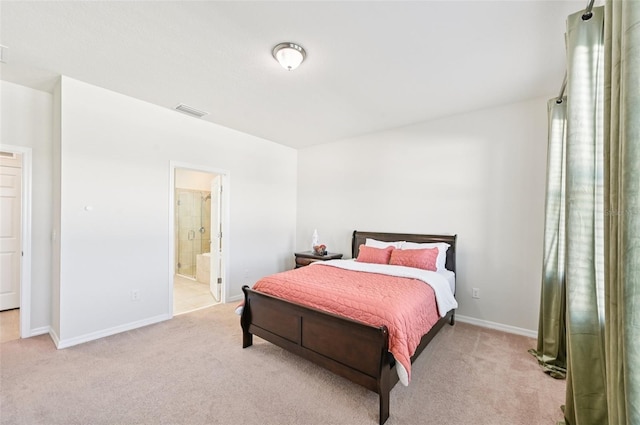 11713 Tetrafin Dr, Riverview, FL 33579 - bedroom with light colored carpet and ensuite bath