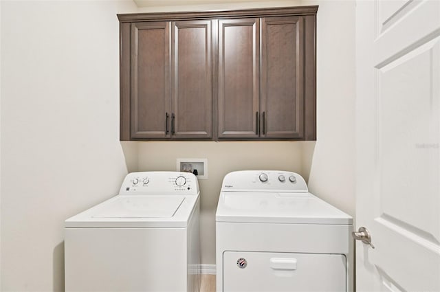11713 Tetrafin Dr, Riverview, FL 33579 - laundry area featuring separate washer and dryer and cabinet space