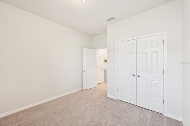11713 Tetrafin Dr, Riverview, FL 33579 - unfurnished bedroom with light colored carpet and a closet
