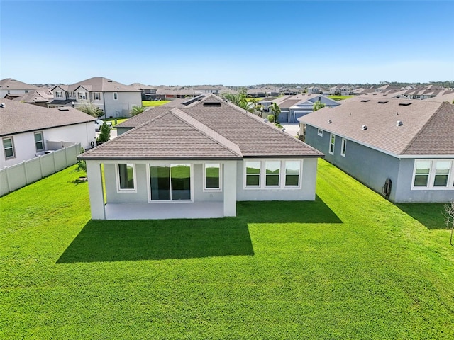 11713 Tetrafin Dr, Riverview, FL 33579 - back of property with roof with shingles, a residential view, a patio, and stucco siding
