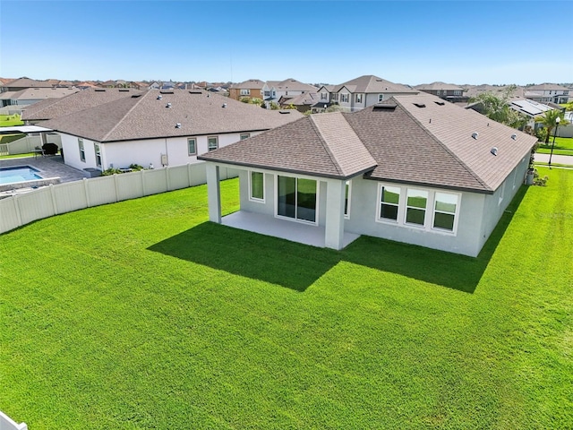 11713 Tetrafin Dr, Riverview, FL 33579 - rear view of property featuring a residential view, roof with shingles, stucco siding, and a patio area