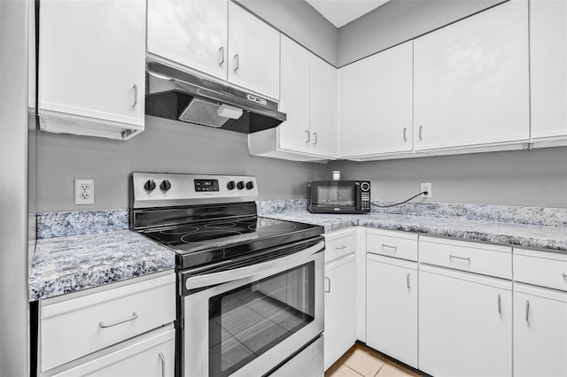 2333 Feather Sound Dr Unit B208, Clearwater, FL 33762 - kitchen featuring electric range, under cabinet range hood, black microwave, and white cabinetry