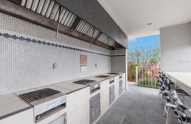 2333 Feather Sound Dr Unit B208, Clearwater, FL 33762 - view of patio / terrace with exterior kitchen