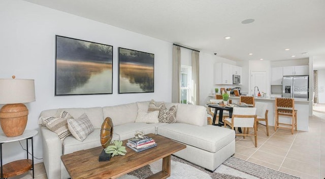 2088 Babbling Brook Blvd, Auburndale, FL 33823 - living room with light tile patterned flooring and recessed lighting
