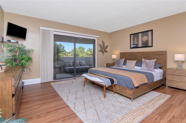 4141 Bayshore Blvd Unit 304, Tampa, FL 33611 - bedroom featuring access to exterior and light wood-style flooring