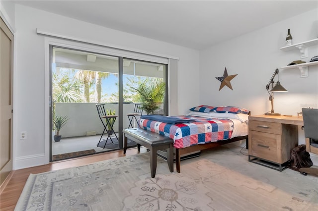 4141 Bayshore Blvd Unit 304, Tampa, FL 33611 - bedroom featuring access to outside and light wood-style flooring