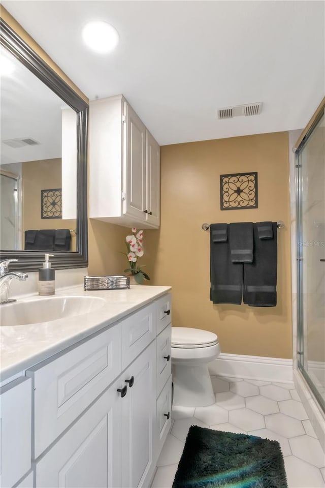 4141 Bayshore Blvd Unit 304, Tampa, FL 33611 - full bath with vanity, tile patterned flooring, and a shower stall