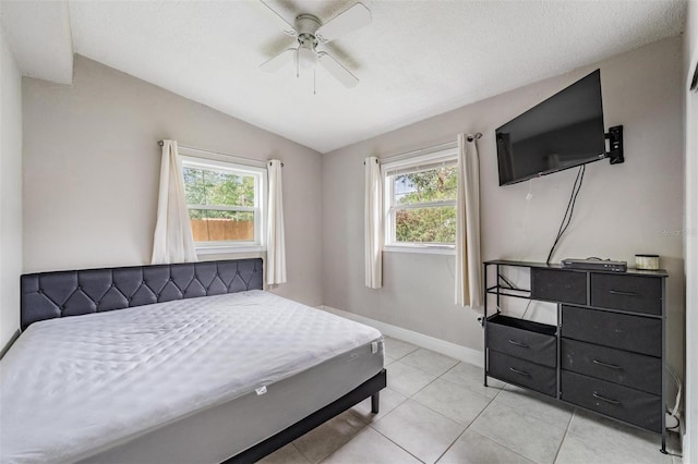 15008 Spokane Rd, Spring Hill, FL 34610 - bedroom featuring vaulted ceiling, ceiling fan, and light tile patterned floors