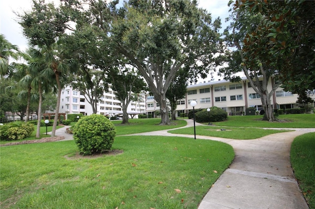 1235 S Highland Ave Unit 5-209, Clearwater, FL 33756 - surrounding community with a yard