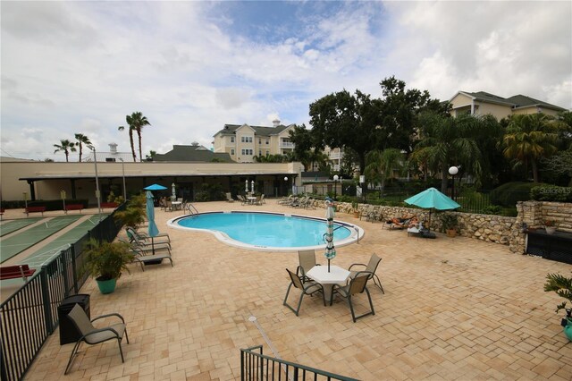 1235 S Highland Ave Unit 5-209, Clearwater, FL 33756 - community pool featuring a patio