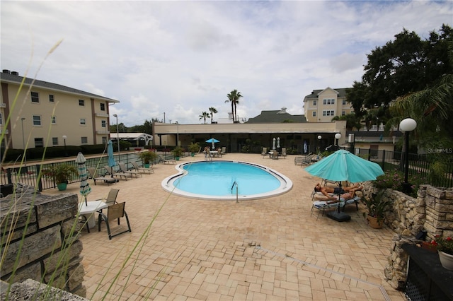 1235 S Highland Ave Unit 5-209, Clearwater, FL 33756 - community pool with a patio