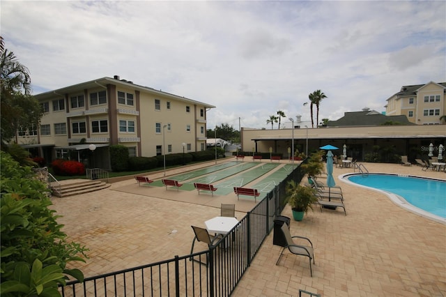 1235 S Highland Ave Unit 5-209, Clearwater, FL 33756 - community pool featuring shuffleboard
