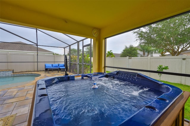 15403 Fire Rock Pl, Ruskin, FL 33573 - view of swimming pool with a hot tub, a fenced backyard, a lanai, and a patio