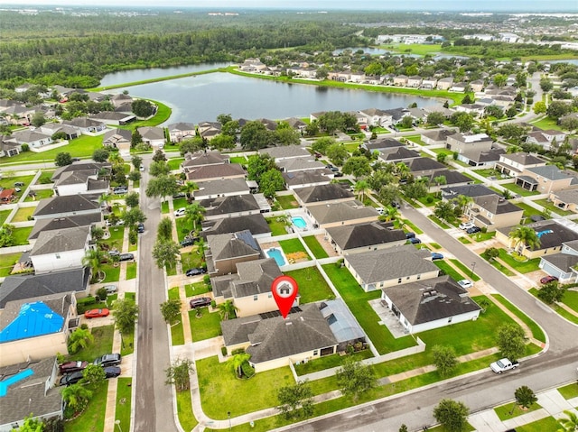 15403 Fire Rock Pl, Ruskin, FL 33573 - aerial view of residential area with a large body of water and a forest