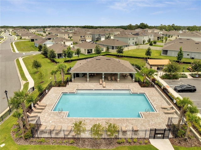 2023 Maple Ridge Dr, Zellwood, FL 32798 - community pool featuring a residential view and a patio area