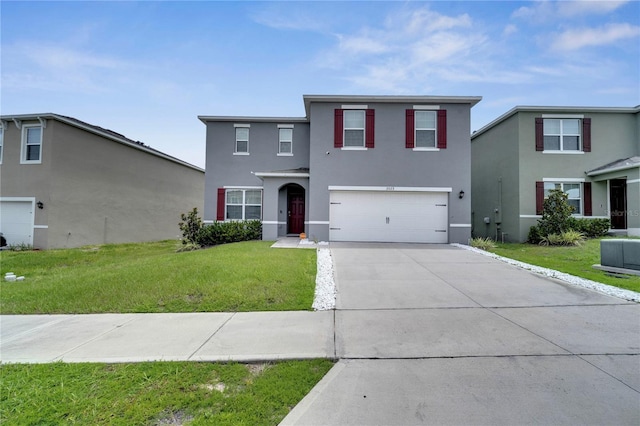 2023 Maple Ridge Dr, Zellwood, FL 32798 - traditional home with stucco siding, driveway, a front yard, and a garage
