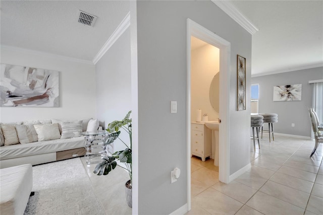 2023 Maple Ridge Dr, Zellwood, FL 32798 - living area with ornamental molding and light tile patterned floors