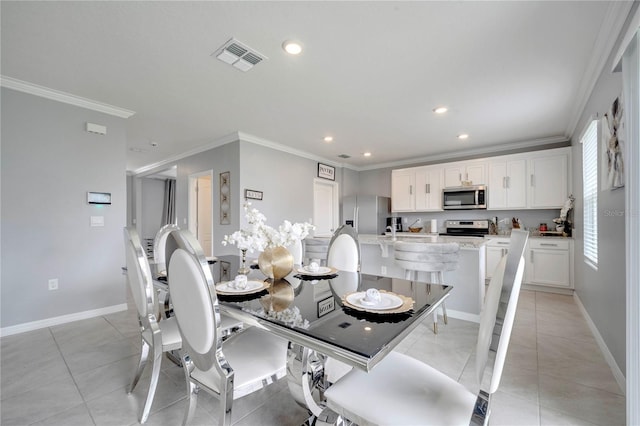 2023 Maple Ridge Dr, Zellwood, FL 32798 - dining area with ornamental molding, recessed lighting, and light tile patterned floors