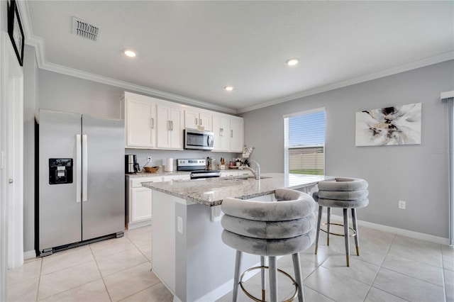 2023 Maple Ridge Dr, Zellwood, FL 32798 - kitchen featuring stainless steel appliances, crown molding, a kitchen breakfast bar, white cabinets, and light stone counters