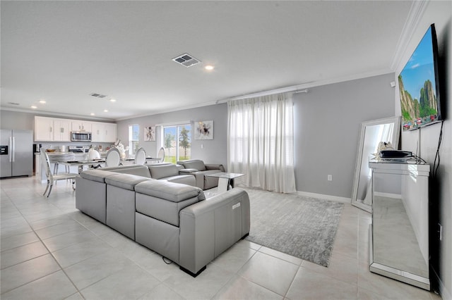 2023 Maple Ridge Dr, Zellwood, FL 32798 - living area with ornamental molding, recessed lighting, and light tile patterned floors