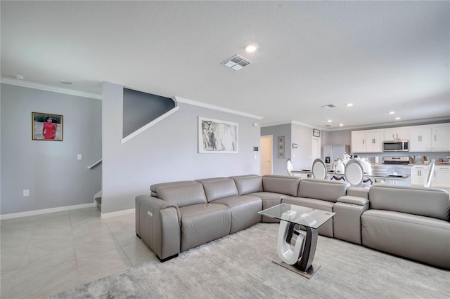 2023 Maple Ridge Dr, Zellwood, FL 32798 - living area featuring crown molding, stairs, recessed lighting, and light tile patterned floors