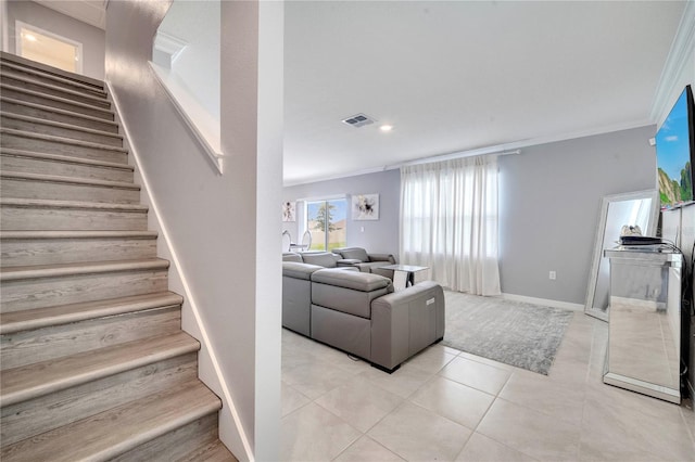 2023 Maple Ridge Dr, Zellwood, FL 32798 - stairs with ornamental molding, tile patterned floors, and recessed lighting