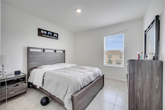 2023 Maple Ridge Dr, Zellwood, FL 32798 - bedroom with light tile patterned floors and baseboards