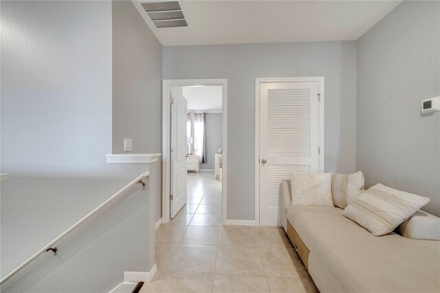 2023 Maple Ridge Dr, Zellwood, FL 32798 - corridor featuring light tile patterned floors and baseboards