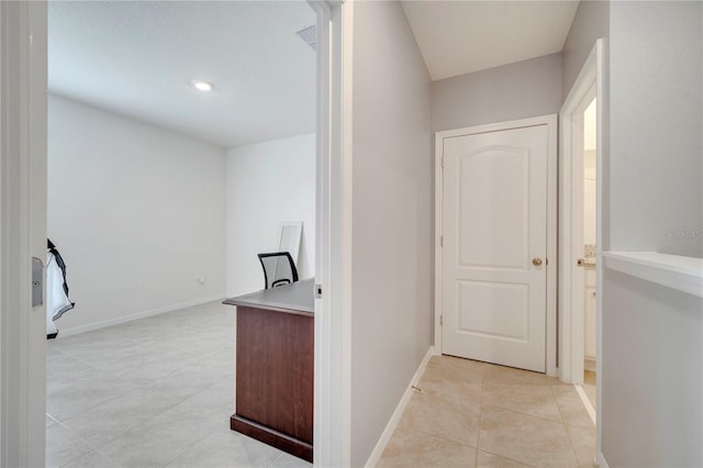 2023 Maple Ridge Dr, Zellwood, FL 32798 - hallway featuring light tile patterned flooring and an office area