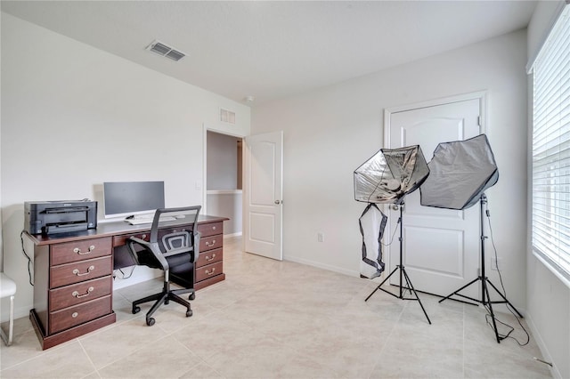 2023 Maple Ridge Dr, Zellwood, FL 32798 - office featuring healthy amount of natural light and light tile patterned flooring