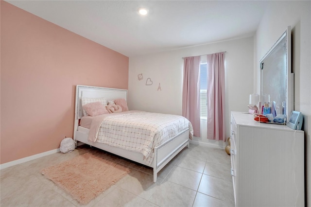 2023 Maple Ridge Dr, Zellwood, FL 32798 - bedroom featuring light tile patterned flooring and baseboards
