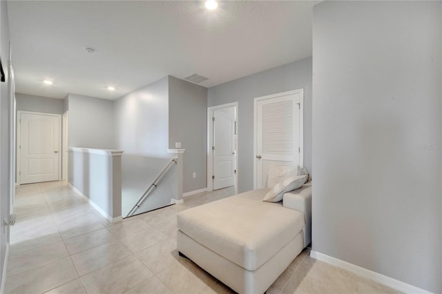 2023 Maple Ridge Dr, Zellwood, FL 32798 - sitting room featuring an upstairs landing, light tile patterned flooring, and recessed lighting