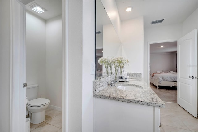 2023 Maple Ridge Dr, Zellwood, FL 32798 - bathroom with vanity, tile patterned flooring, connected bathroom, and recessed lighting