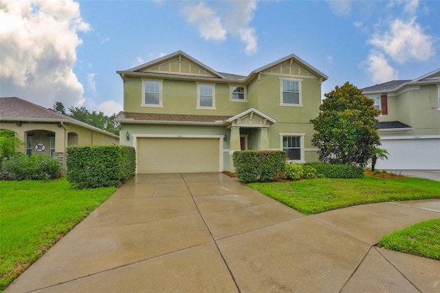 2605 Stardale Way, Lutz, FL 33558 - craftsman house featuring an attached garage, stucco siding, a front lawn, and driveway