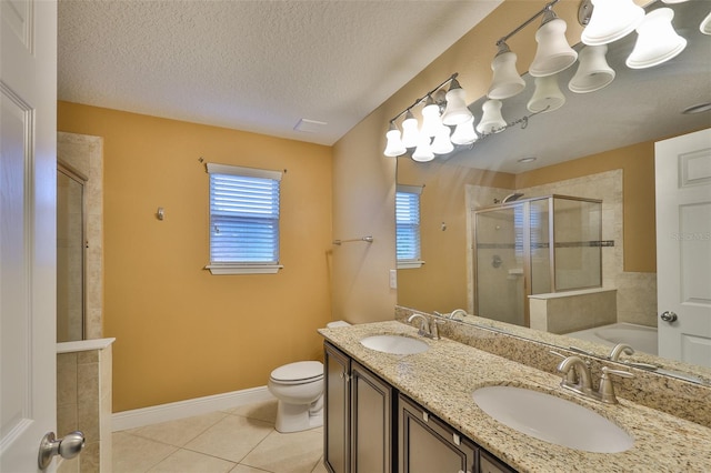 2605 Stardale Way, Lutz, FL 33558 - bathroom with a stall shower, healthy amount of natural light, tile patterned flooring, a garden tub, and a textured ceiling